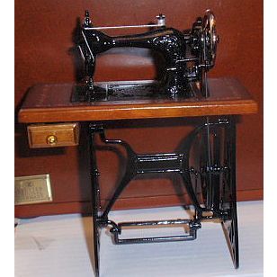 Wood and metal sewing machine miniature