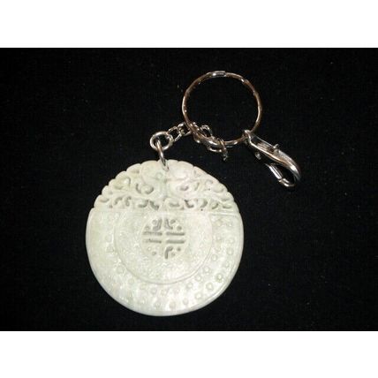 Exquisite elaborate carved large round white jade keyring bag charm