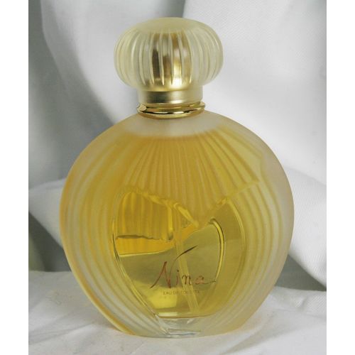 Nina by Nina Ricci 75 ml / 2.5 oz edt spray Lalique Vintage Bottle