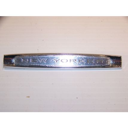 1963 CHRYSLER NEW YORKER DOOR PANEL EMBLEM OEM #2292563