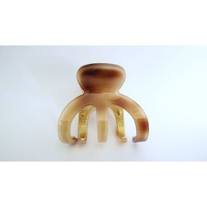 Medium brown beige gold tone textured acrylic and metal hair claw clip