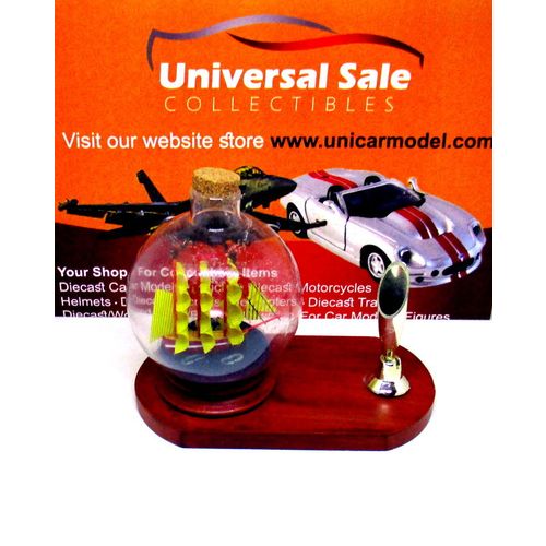 LITTLE SAILING BOAT IN A GLASS BALL ON WOOD PEN STAND,WOODEN NAUTICAL MODEL