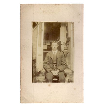 SMART YOUNG MAN antique photograph postcard drawing room rubber plant #