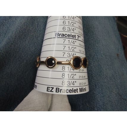 KATE SPADE NEW YORK GOLDEN METAL AND BLACK ACRYLIC STONES BANGLE CUFF BRACELET