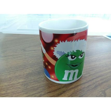 M&M , The GREEN Candy Character. Holiday Version Advertising. Coffee Mug Cup.