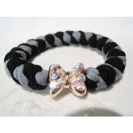 Bow shaped hair tie pony tail holder with swarovski crystals