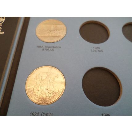 Whitman coin folder- Canada - Dollar - 1968/1984 - with 12 coins - NOT COMPLETE