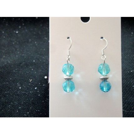 Staggering pair of multi faceted babby blue crystal glass short earrings