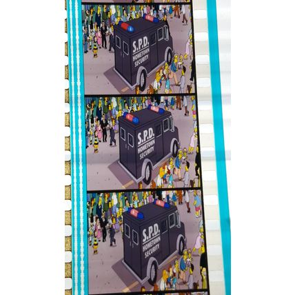 Simpsons Movie. Pk FE FE - 040N. 1 STRIP OF 5 - 35MM FILM CELLS