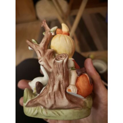 Small Ceramic Child With goose