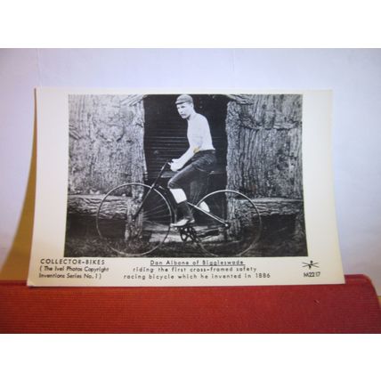 1886 racing bicycle. DAN ALBANE OF BIGGLESWADE, BEDFORDSHIRE unused postcard =