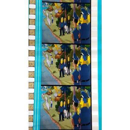 Simpsons Movie. Pk FE FE - 021u. 1 STRIP OF 5 - 35MM FILM CELLS