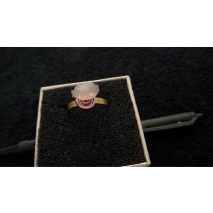Ethiopian Welo Fire opal and set in gold anodized aluminum setting