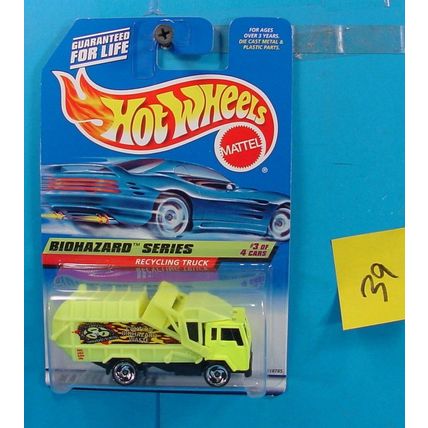 C39 HOT WHEELS BIOHAZARD SERIES RECYCLING TRUCK #719 NEON YELLOW NEW ON CARD