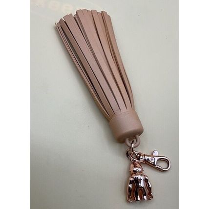 A Very Rare Large Tan Rubber Kipling Clip Key Fob Ring Keychain