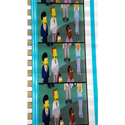 Simpsons Movie. Pk FE FE - 007g. 1 STRIP OF 5 - 35MM FILM CELLS