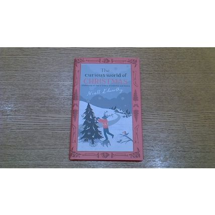 The Curious World of Christmas. Niall Edworthy (First Edition Hardback) 2007