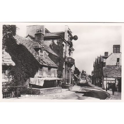 ED 246 SWANAGE -THE HIGH STREET. RP POSTCARD