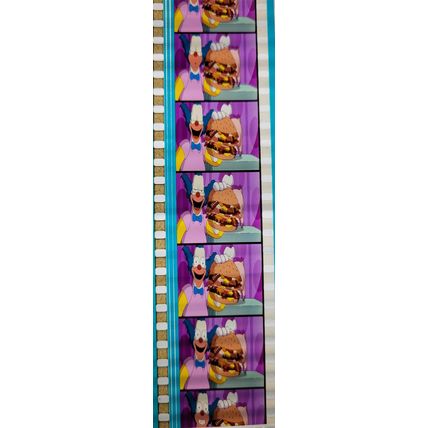 Simpsons Movie. Pk GEB - c062J . 1 STRIP OF 5 - 35MM FILM CELLS