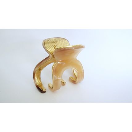 Medium brown beige gold tone textured acrylic and metal hair claw clip