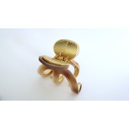 Medium brown beige gold tone textured acrylic and metal hair claw clip