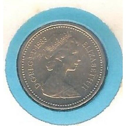 1983 First day cover including a genuine £1 coin in a clear blister