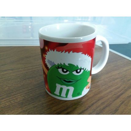 M&M , The GREEN Candy Character. Holiday Version Advertising. Coffee Mug Cup.