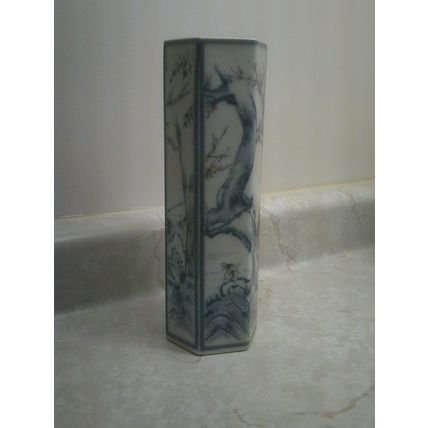 Tall slender blue Asian design ceramic vase