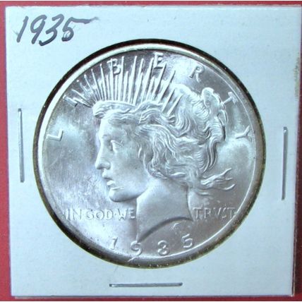 1935 Peace Dollar. This Coin is a replica and contains NO precious metal.