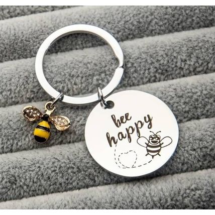 BEE HAPPY KEYRING SILVERY COLOURED
