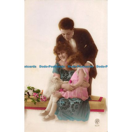 R091903 Old Postcard. Family. Woman Man and Daughter