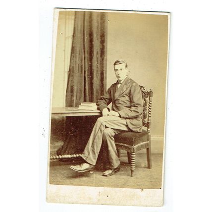 Victorian cdv photo young man seated Brompton Road London photographer