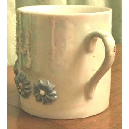 Baby Cup with raised "Baby and flowers" Germany Motto China - Antique