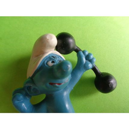 Weightlifter smurf with dumb bell and no top