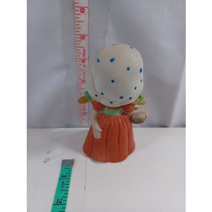 Vintage 4 1/2 inch ceramic girl with flower basket very good