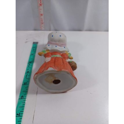 Vintage 4 1/2 inch ceramic girl with flower basket very good