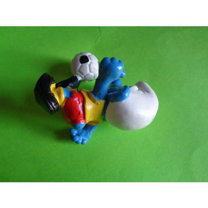 Footballer smurf complete with foot ball