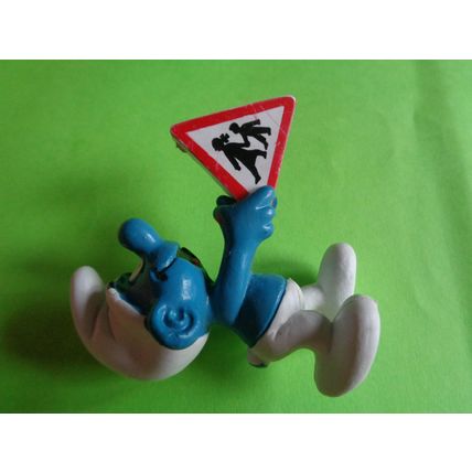 Smurf with a children crossing traffic safety sign