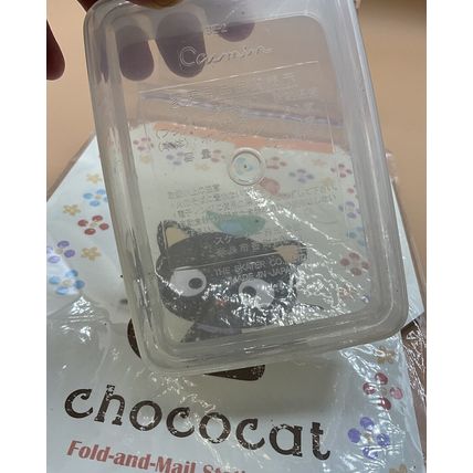 This is a very sweet vintage Sanrio 2005 lot of two Chococat items for