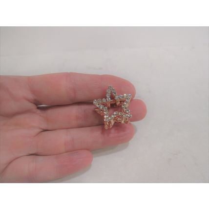 Small mini rose gold star shaped hair claw clip with crystals