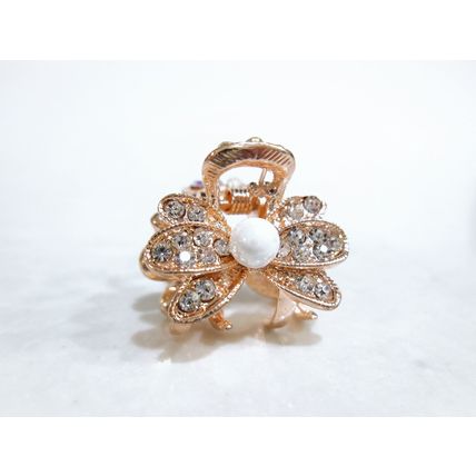 Small mini rose gold flower shaped hair claw clip with pearl and crystals