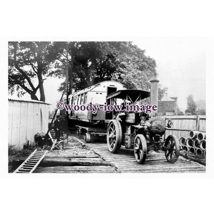 pu0301 - Traction Engine Northern Line stock being delivered Morden - print 6x4