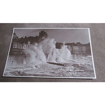 Judges real photo Postcard -Rough sea - Hastings Sussex