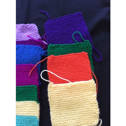 12 knitted squares in Various Colours