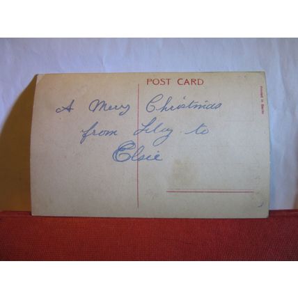 HAPPY CHRISTMAS used vintage postcard RP children with mistletoe