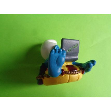 Workaholic smurf with laptop rubber ring and drink