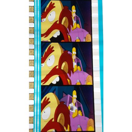 Simpsons Movie. Pk FE FE - 015o. 1 STRIP OF 5 - 35MM FILM CELLS