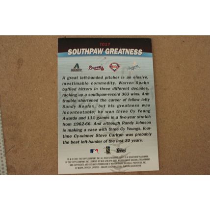 2001 topps southpaw greatness diamond randy johnson/ bravas warren spahn/ philli