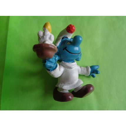Smurf with a candle
