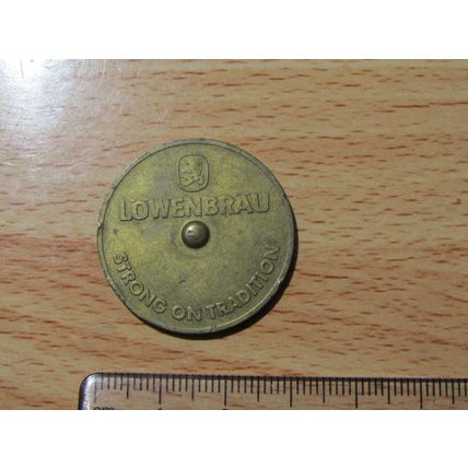 Lowenbrau Strong on Traditions Spinning Pointer Game Token (e720 )
